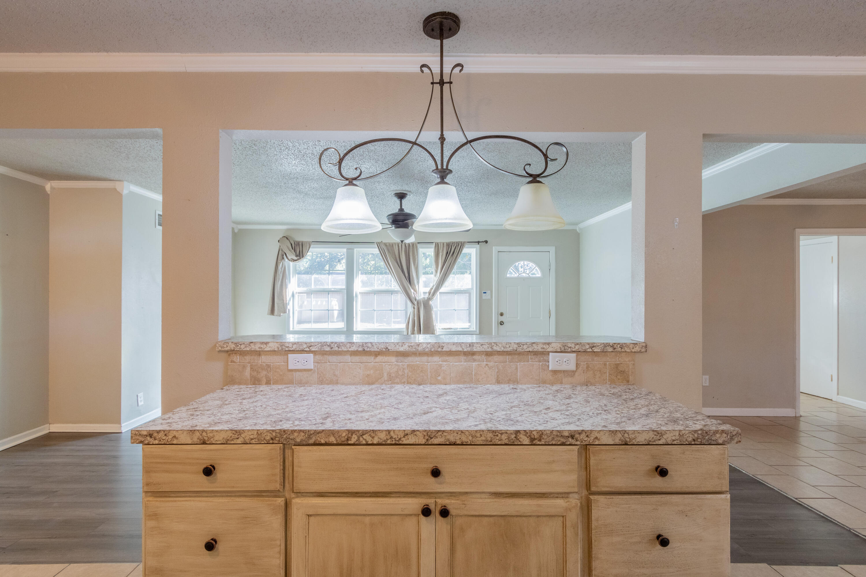 4021 38th Street Lubbock, TX 79413 - Photo 10 of 32 a bathroom with a granite countertop sink and a mirror