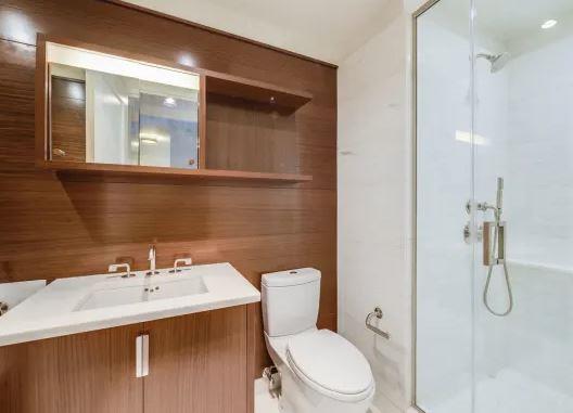 60 Riverside Boulevard, Unit 623 Manhattan, NY 10069 - Photo 5 of 12 a bathroom with a sink toilet and shower