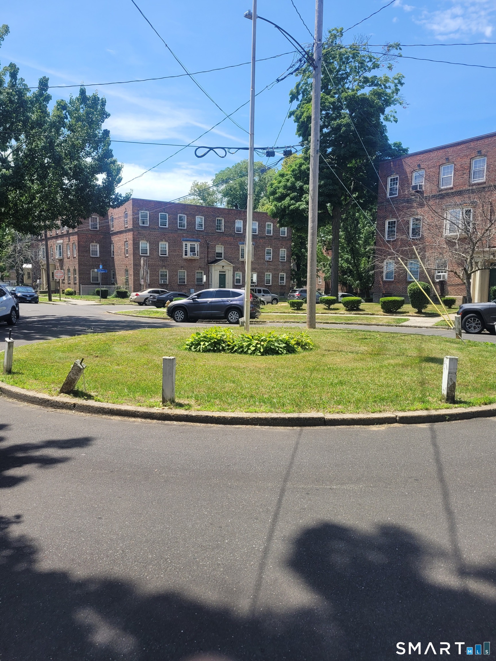 606 Wilmot Avenue, Unit 4 Bridgeport, CT 06607 - Photo 3 of 16 a view of a swimming pool with a patio