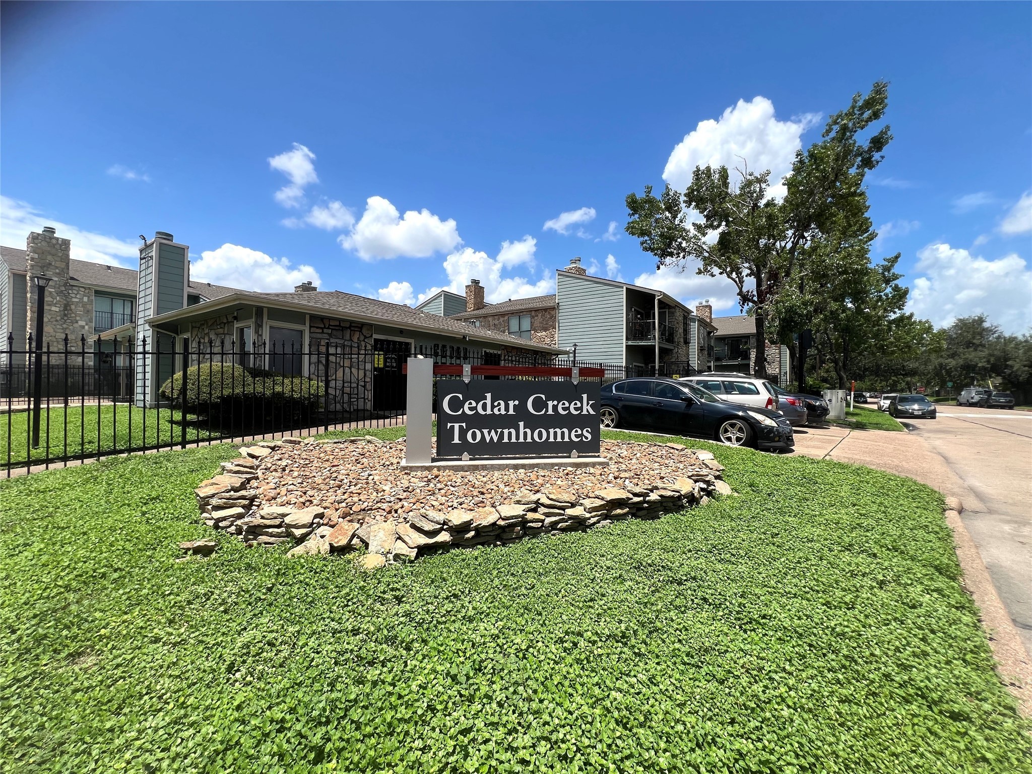 3754 Tanglewilde Street, Unit 9 Houston, TX 77063 - Photo 1 of 26 a view of a house with a yard