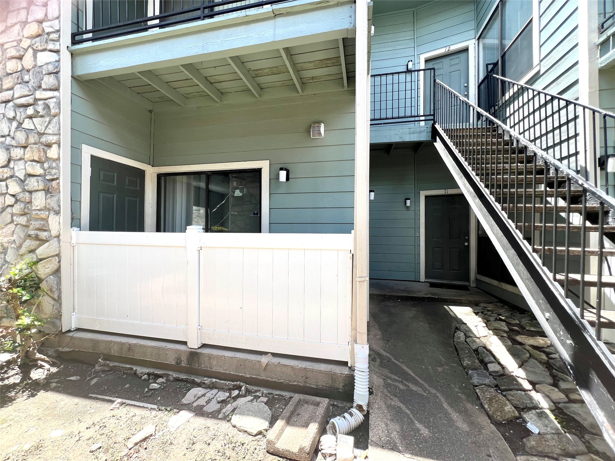 3754 Tanglewilde Street, Unit 9 Houston, TX 77063 - Photo 24 of 26 a view of a balcony with door