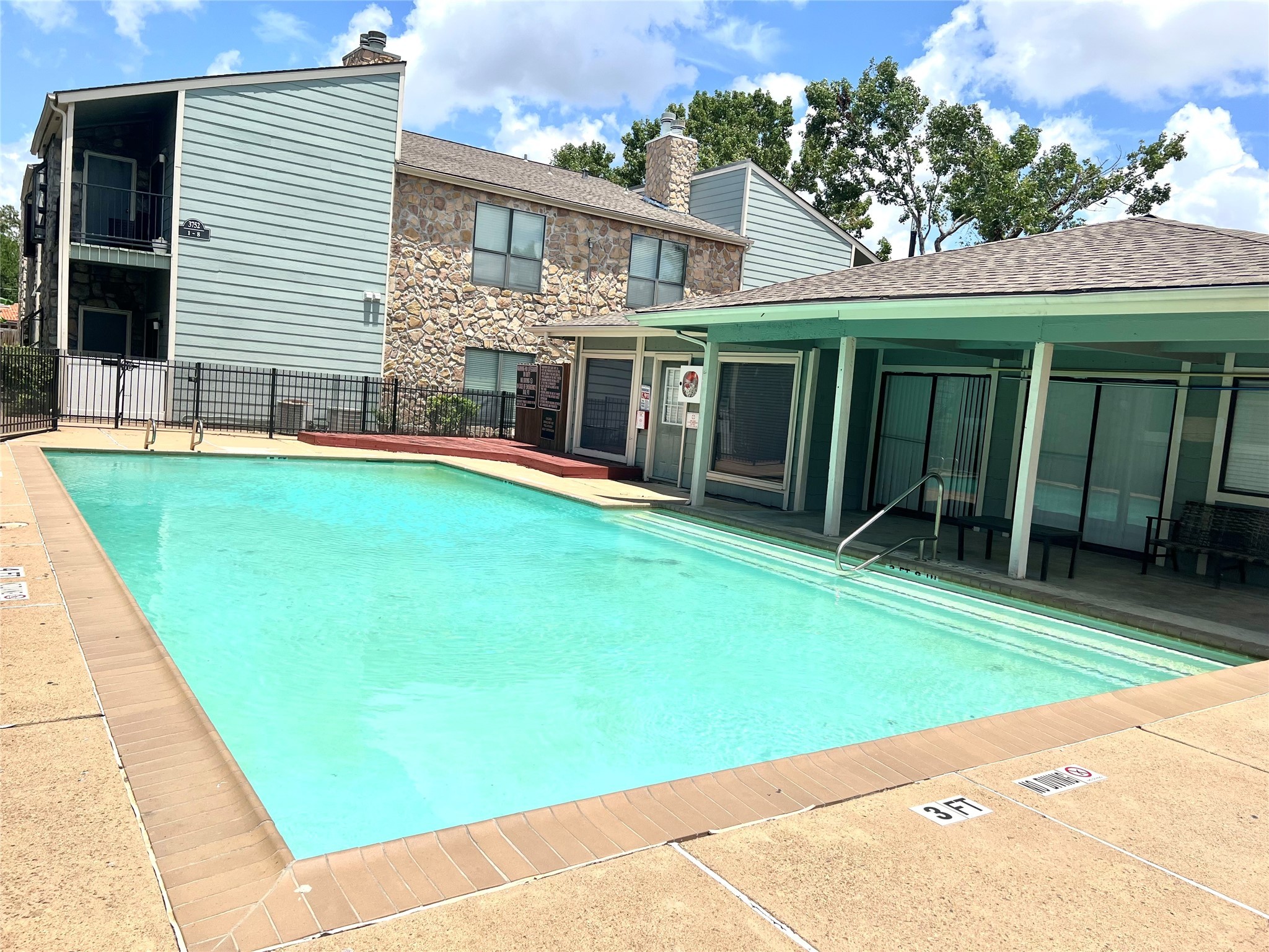 3754 Tanglewilde Street, Unit 9 Houston, TX 77063 - Photo 26 of 26 a view of a house with a backyard