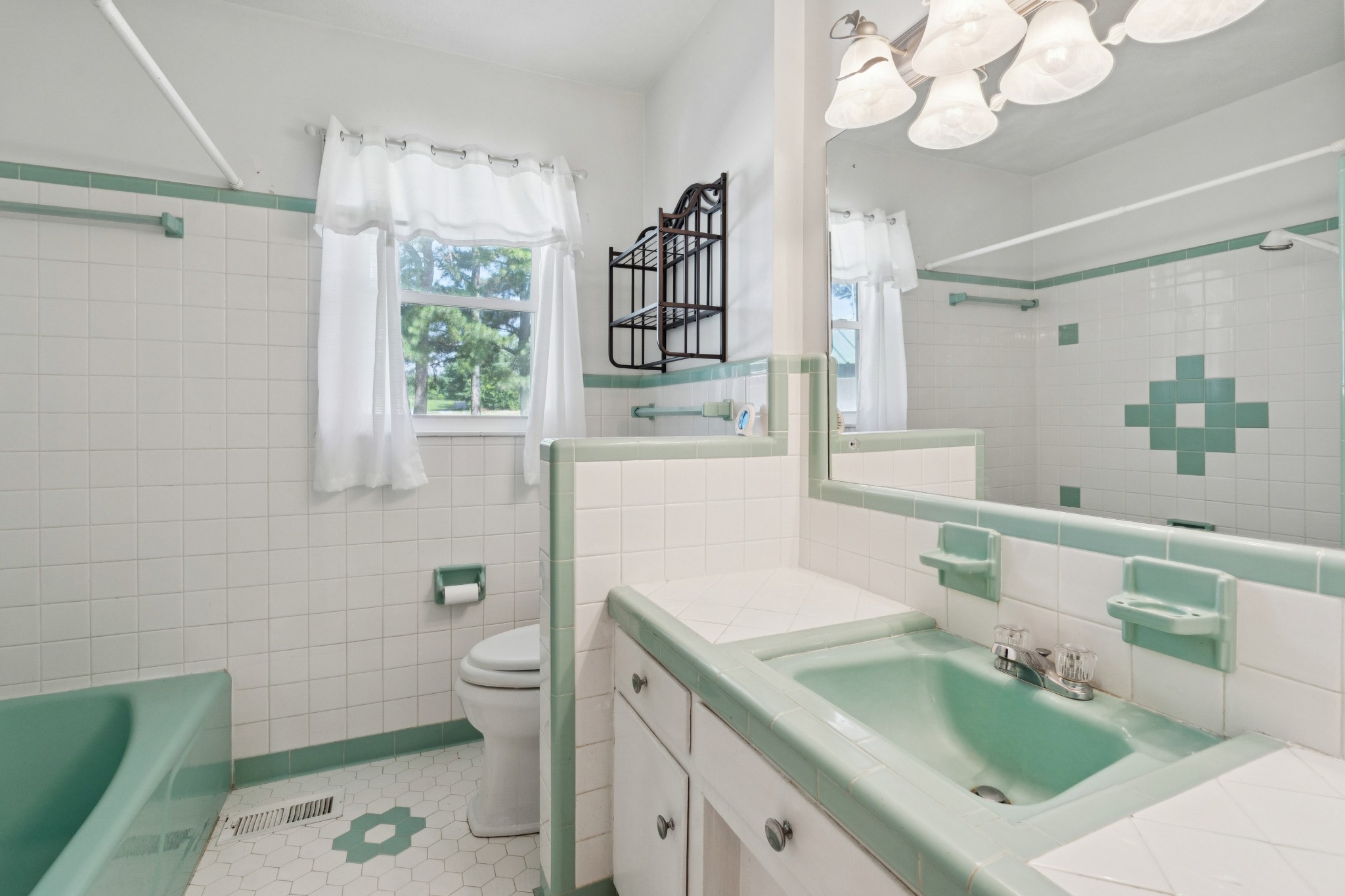 4272 Highway 49 Springfield, TN 37172 - Photo 29 of 50 a bathroom with a sink a toilet and a mirror