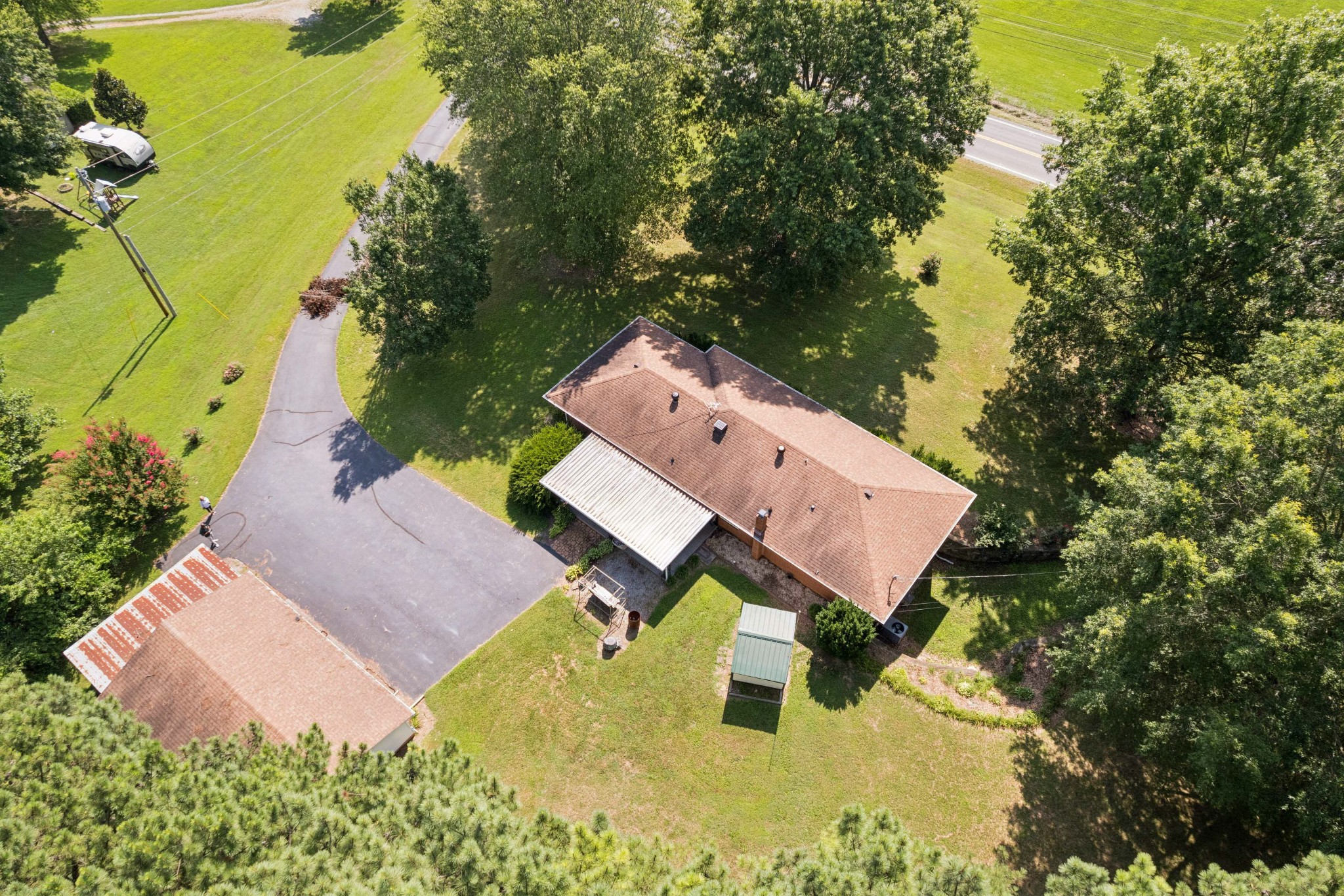 4272 Highway 49 Springfield, TN 37172 - Photo 50 of 50 an aerial view of a house with swimming pool and garden