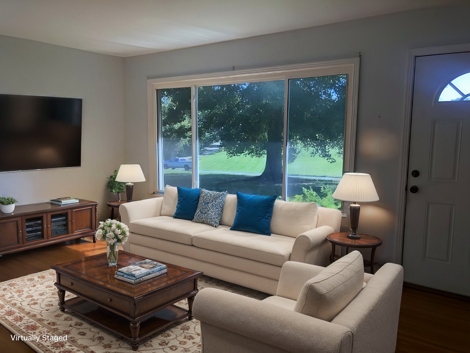 4272 Highway 49 Springfield, TN 37172 - Photo 8 of 50 a living room with furniture a flat screen tv and a floor to ceiling window