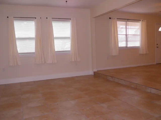 an empty room with windows