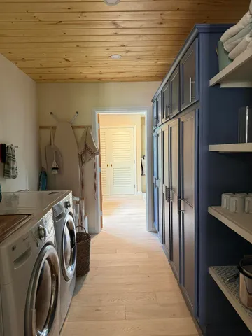 a view of a storage & utility room with washer and dryer