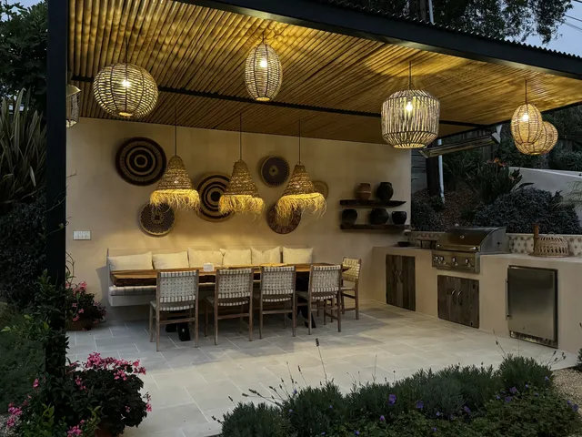 a kitchen with stainless steel appliances granite countertop a stove and cabinets