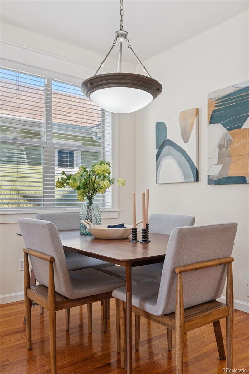 2872 Alton Street Denver, CO 80238 - Photo 11 of 46 a dining room with furniture and window