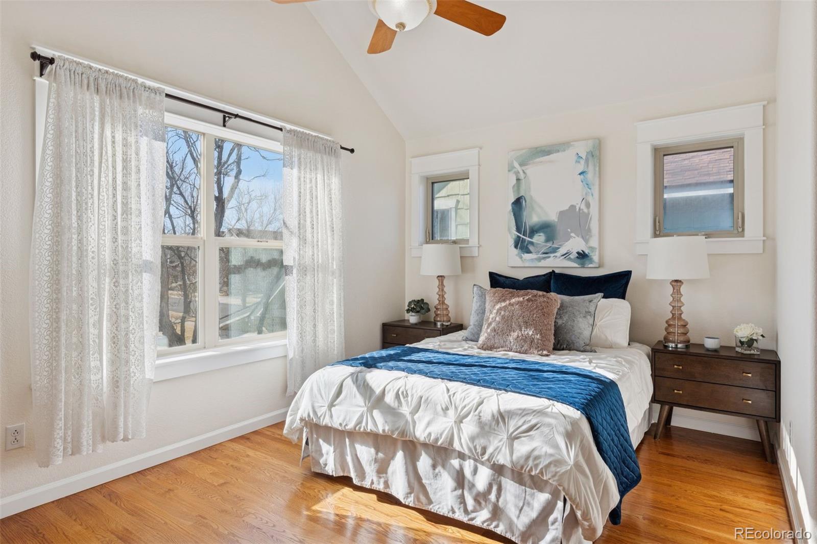2872 Alton Street Denver, CO 80238 - Photo 18 of 46 a bedroom with a bed and a window