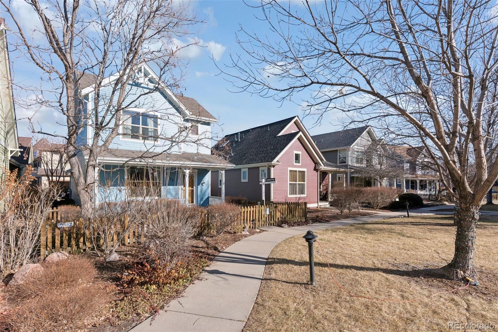 2872 Alton Street Denver, CO 80238 - Photo 2 of 46 a front view of a house with a yard
