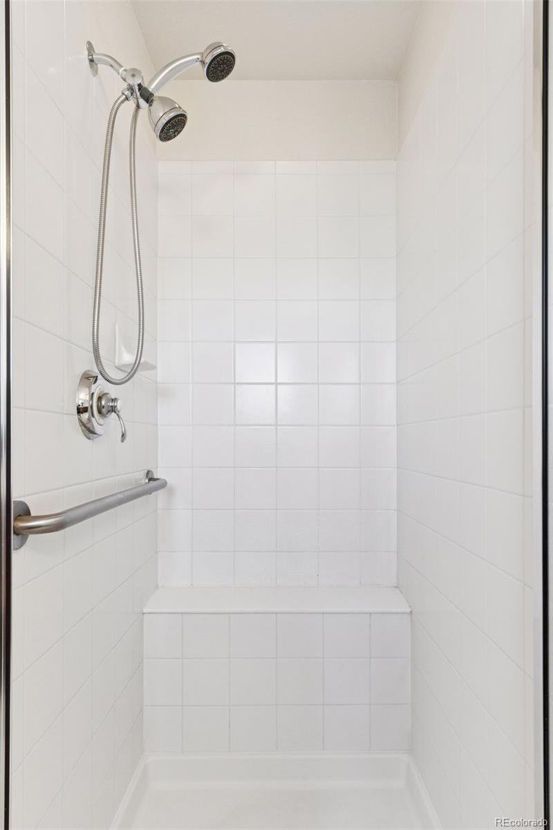 2872 Alton Street Denver, CO 80238 - Photo 23 of 46 a bathroom with a shower