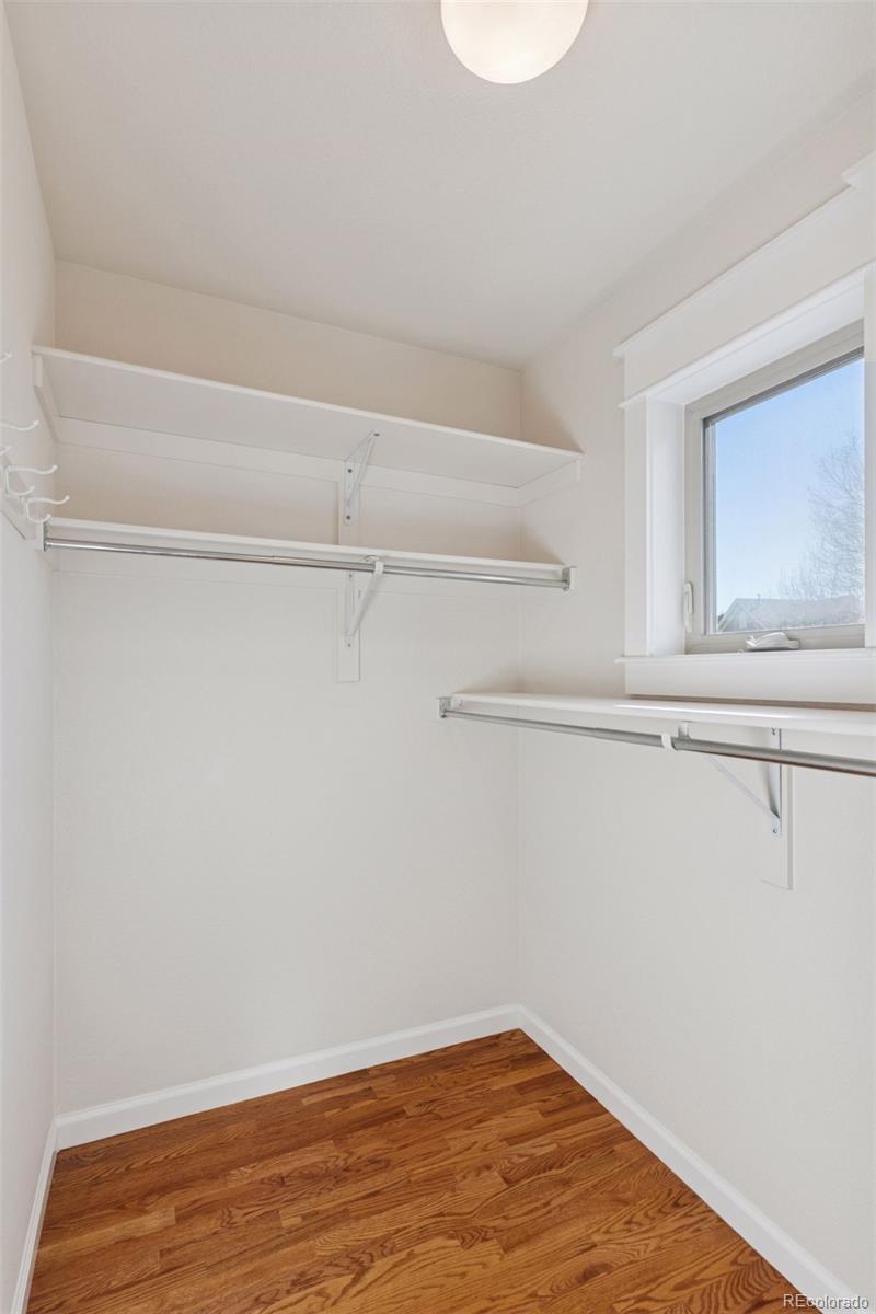 2872 Alton Street Denver, CO 80238 - Photo 24 of 46 a view of a room with racks on the wall