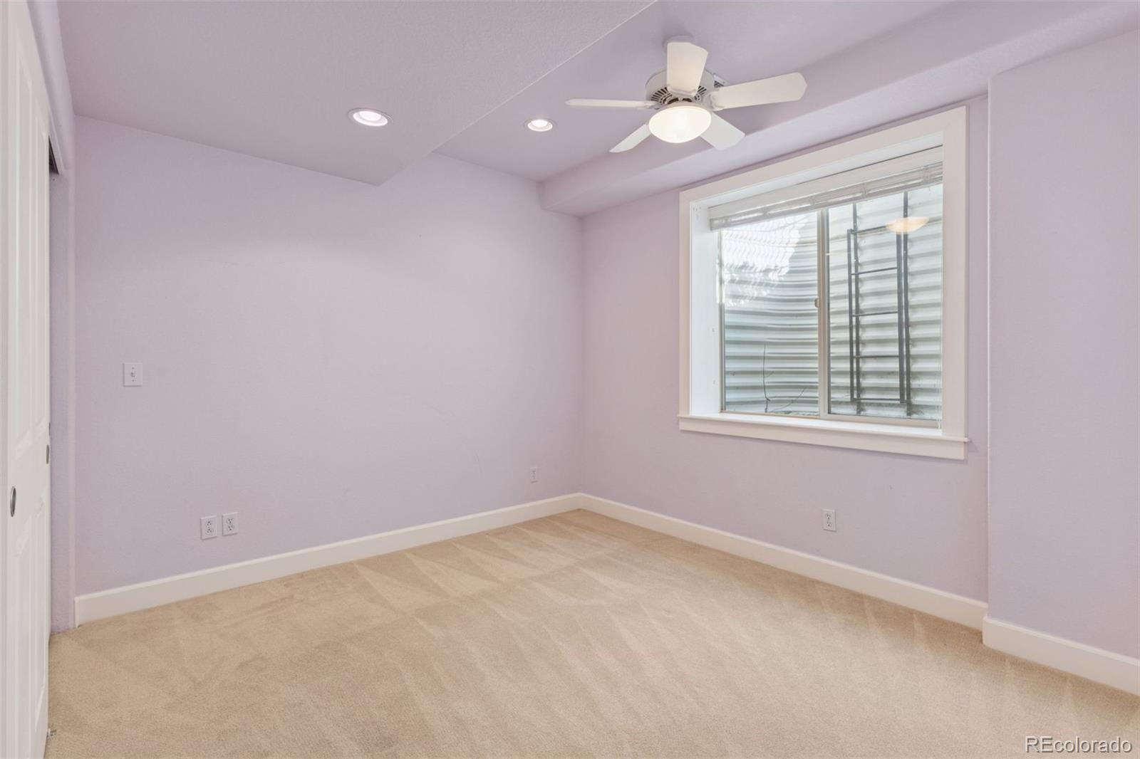 2872 Alton Street Denver, CO 80238 - Photo 33 of 46 wooden floor in an empty room with a window