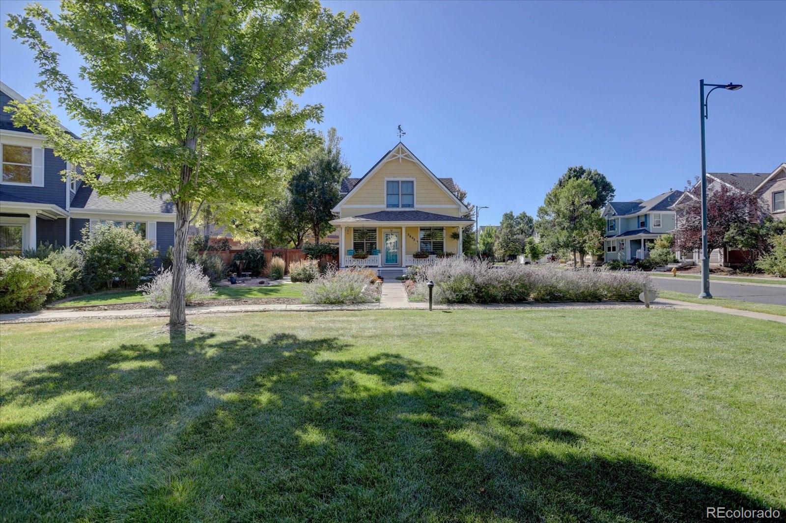 2872 Alton Street Denver, CO 80238 - Photo 40 of 46 a front view of a house with a yard