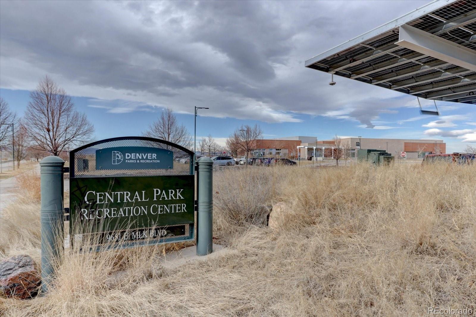 2872 Alton Street Denver, CO 80238 - Photo 45 of 46 a view of a street sign under a large tree