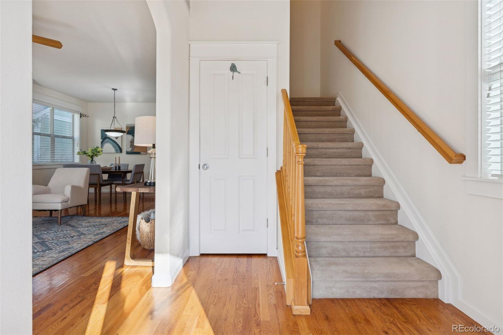 2872 Alton Street Denver, CO 80238 - Photo 5 of 46 a view of entryway and hall with wooden floor