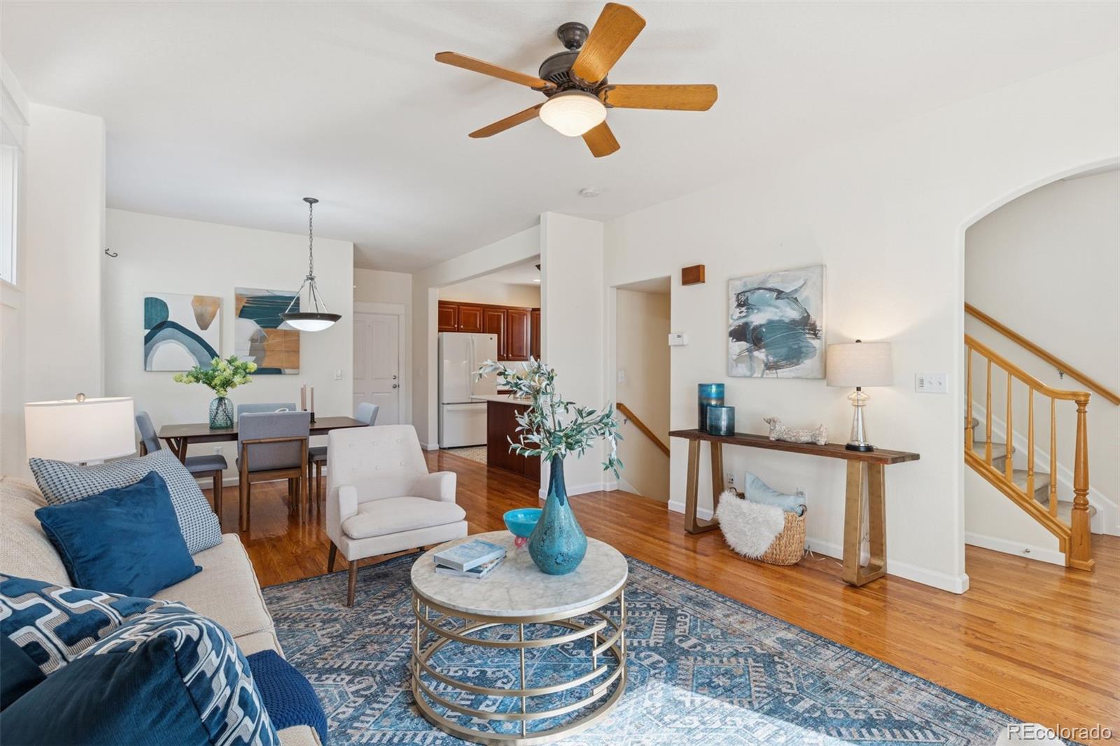 2872 Alton Street Denver, CO 80238 - Photo 9 of 46 a living room with furniture and a wooden floor