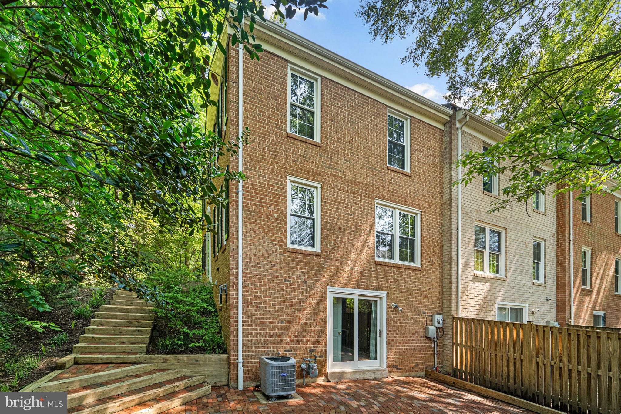 2360 Albot Road Reston, VA 20191 - Photo 30 of 35 a front view of a house with a garden