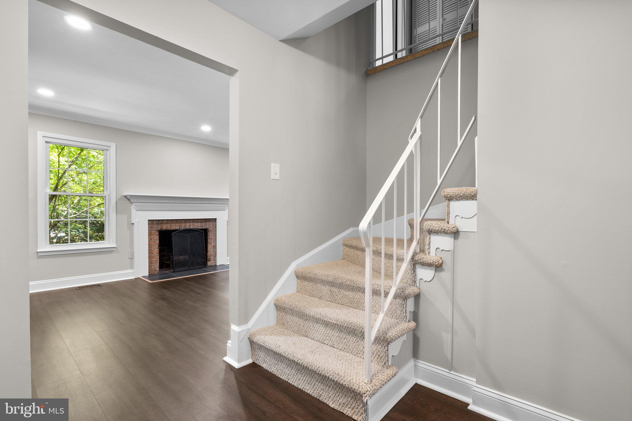 2360 Albot Road Reston, VA 20191 - Photo 3 of 35 a view of entryway and hall with wooden floor