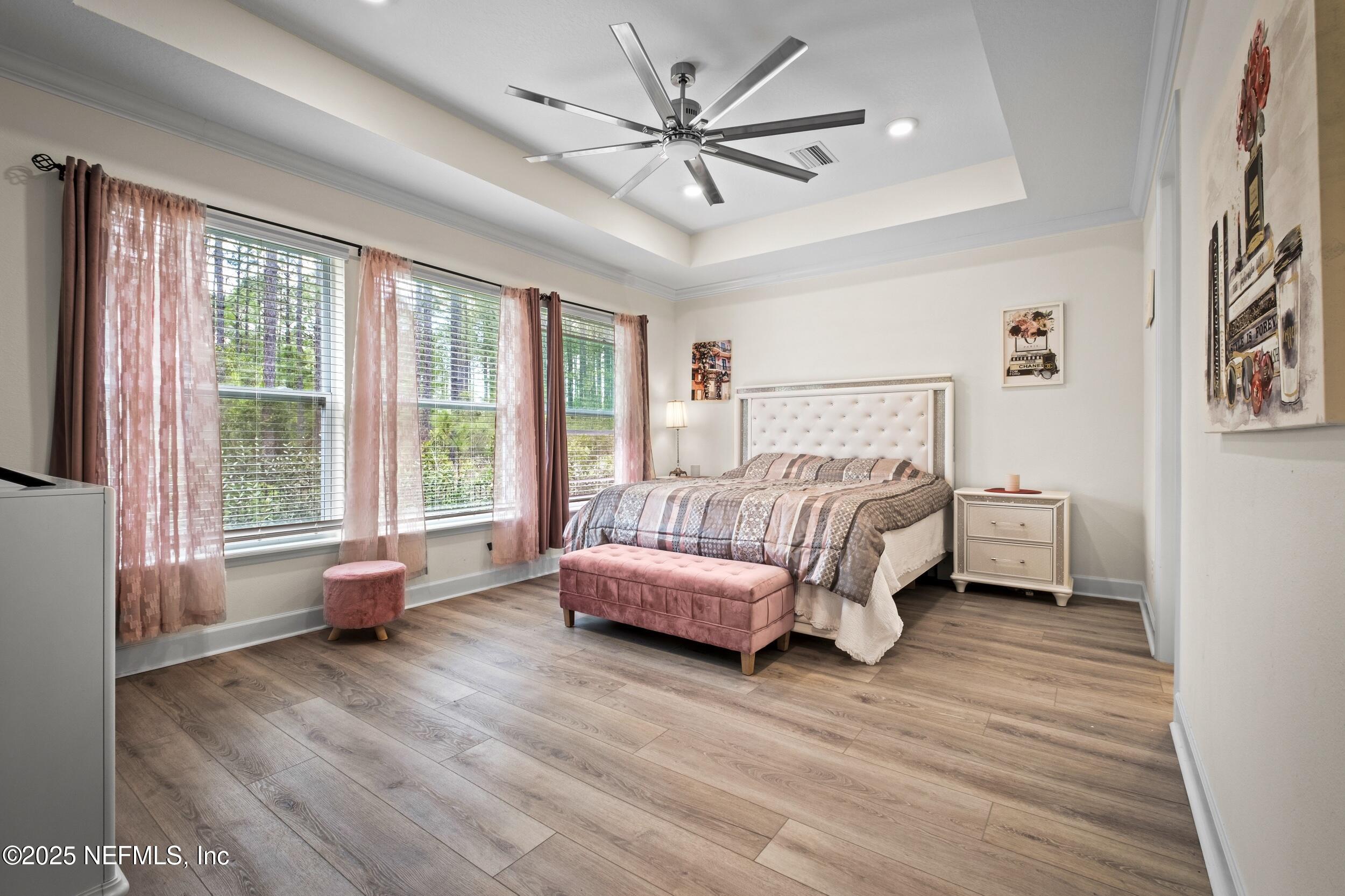 80 Widener Court St. Johns, FL 32259 - Photo 20 of 60 a bedroom with furniture and a large window