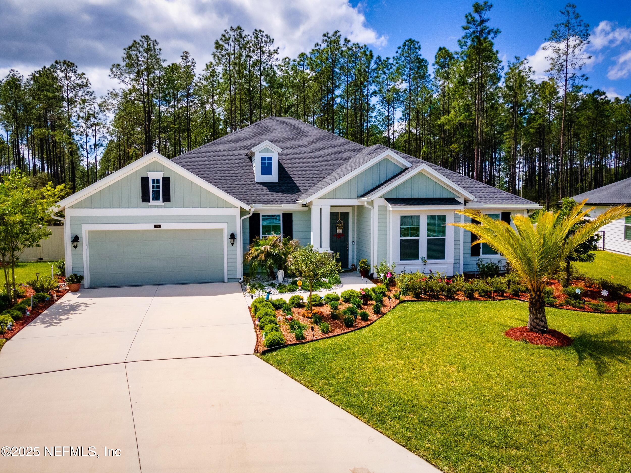 80 Widener Court St. Johns, FL 32259 - Photo 53 of 60 a front view of a house with garden