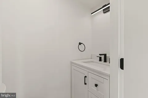 a bathroom with a sink and a vanity