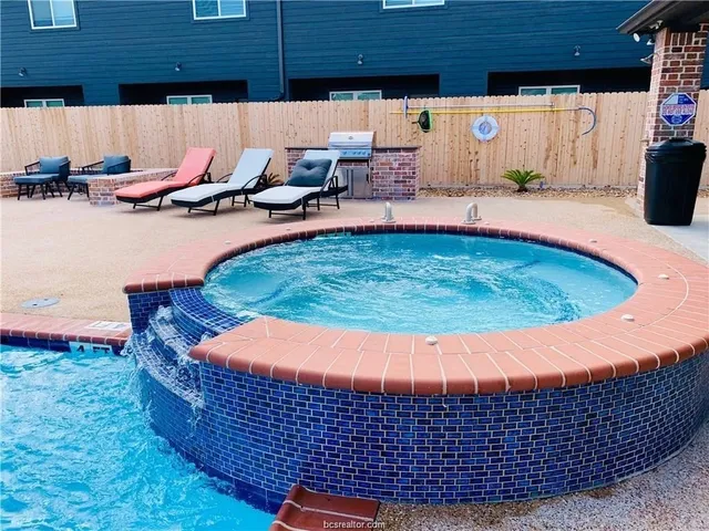 a room with patio outer table and chairs