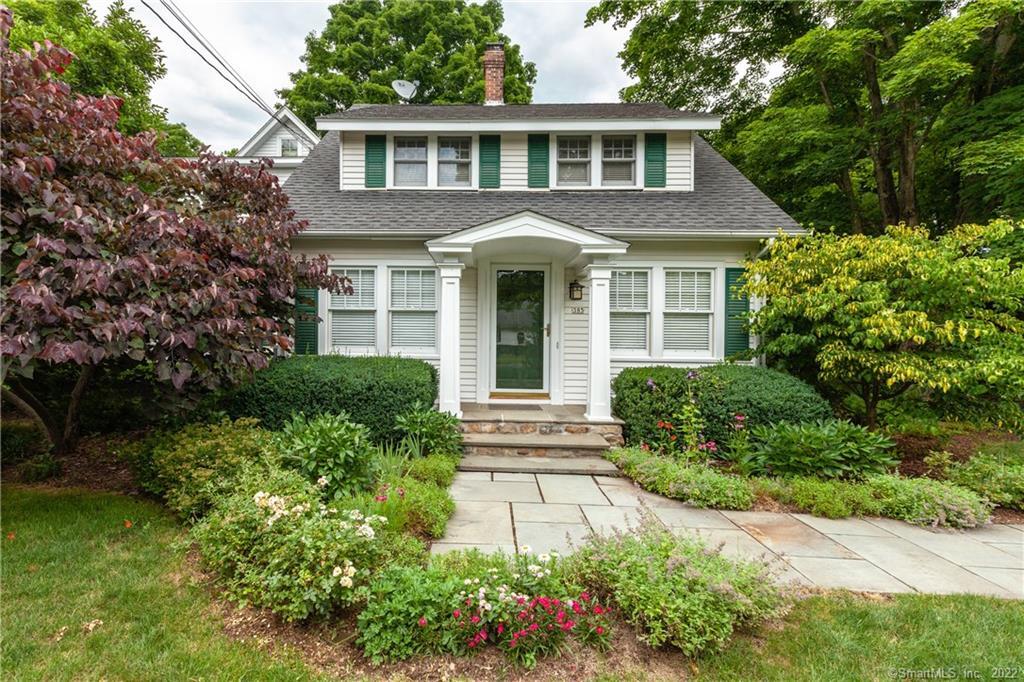 385 Tanner Marsh Road Guilford, CT 06437 - Photo 1 of 1 a front view of a house with garden