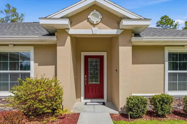 a front view of a house with a garage