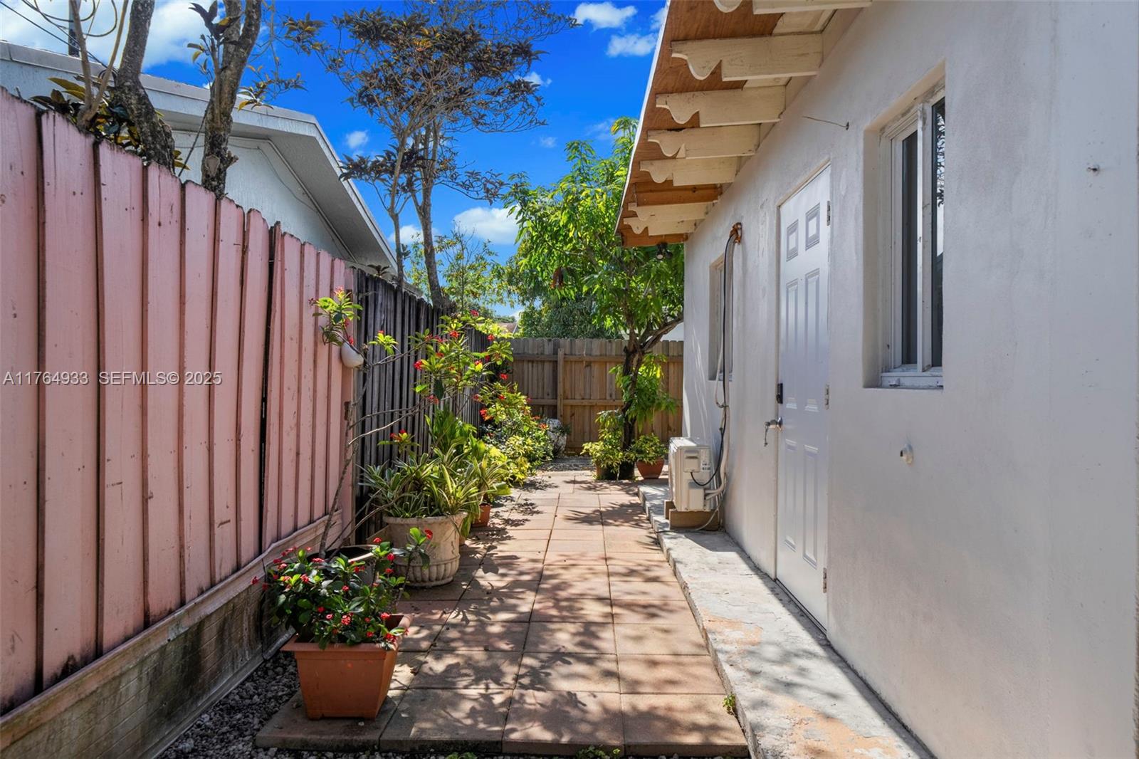 5810 Southwest 22nd Street Miami, FL 33155 - Photo 29 of 54 a view of a backyard with potted plants