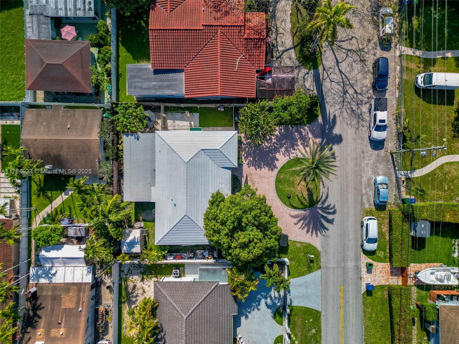 5810 Southwest 22nd Street Miami, FL 33155 - Photo 30 of 54 an aerial view of a house with a garden and plants