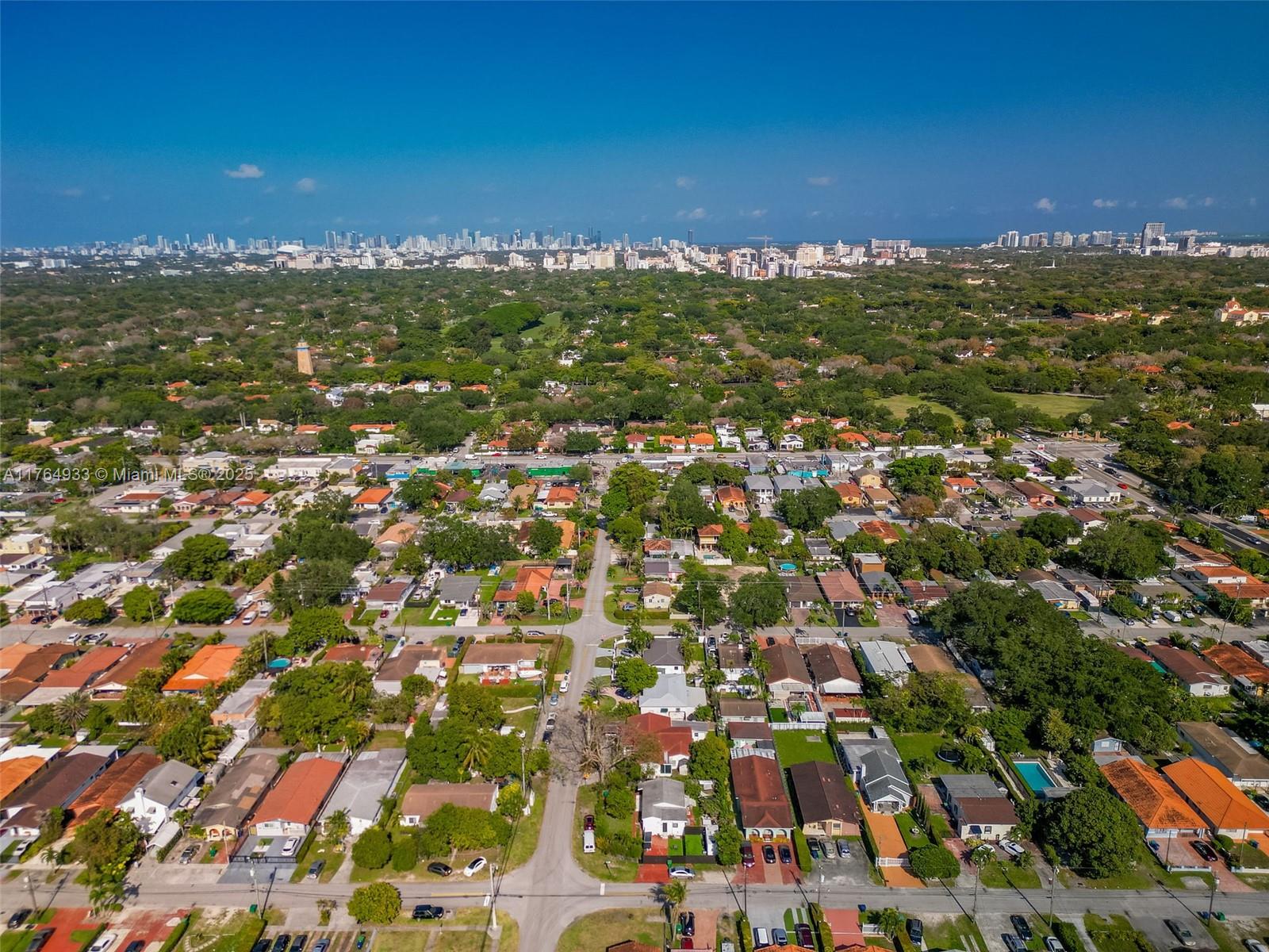 5810 Southwest 22nd Street Miami, FL 33155 - Photo 32 of 54 an aerial view of residential houses with city view