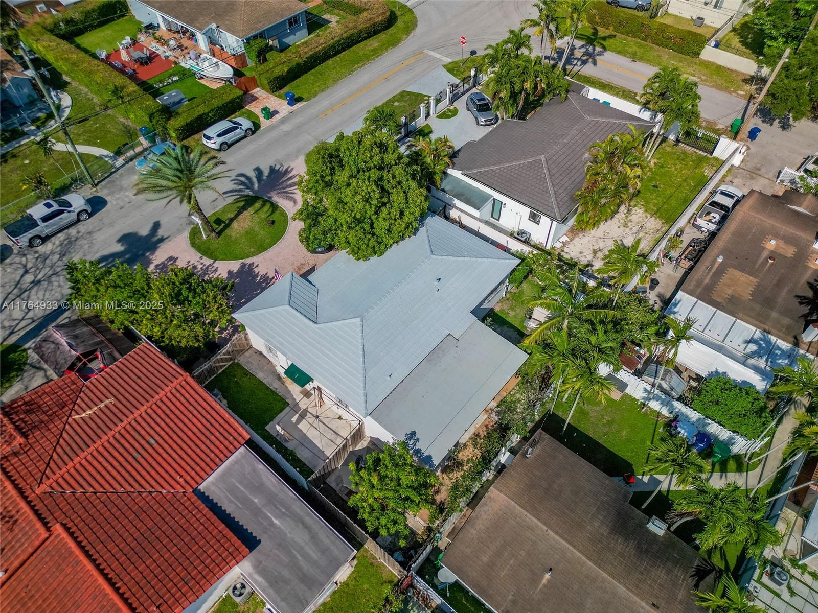5810 Southwest 22nd Street Miami, FL 33155 - Photo 46 of 54 an aerial view of a house with a yard