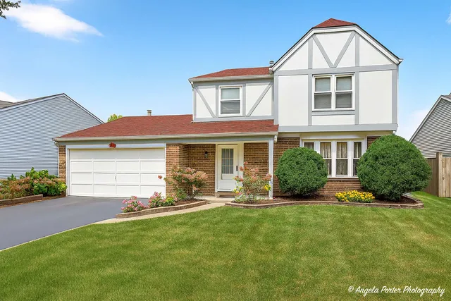a view of a hallway with entryway door