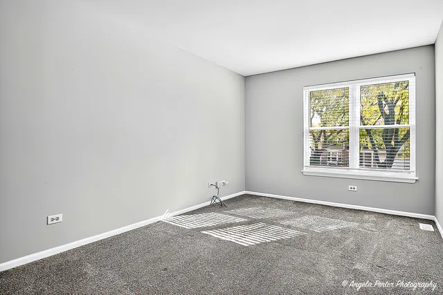 a view of a deck with a yard