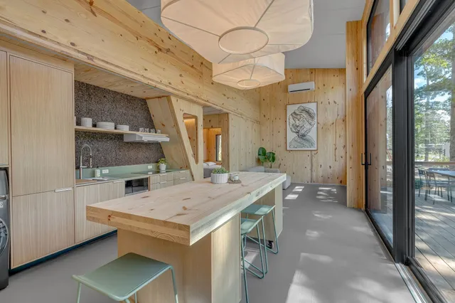 a room with a table and chairs