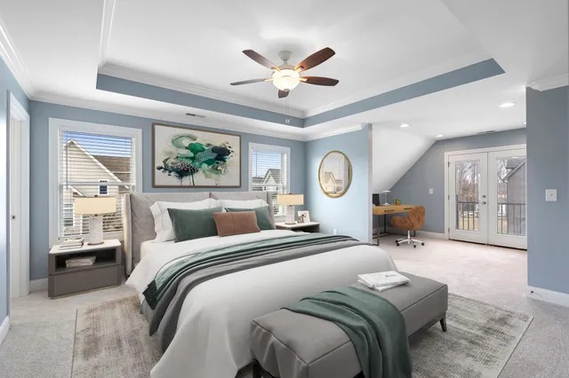 a bed room with a bed couch and dresser