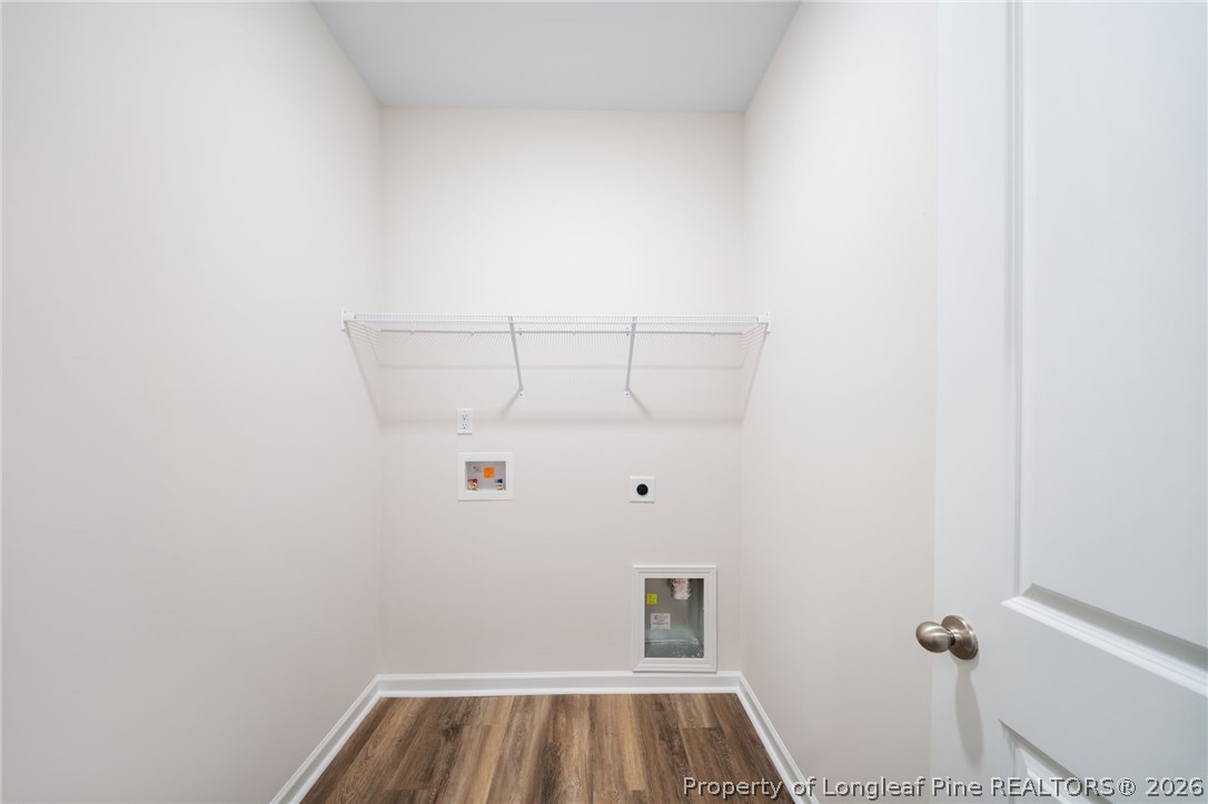 4052 Lofton Street Wade, NC 28395 - Photo 9 of 22 a view of small space with racks on the wall