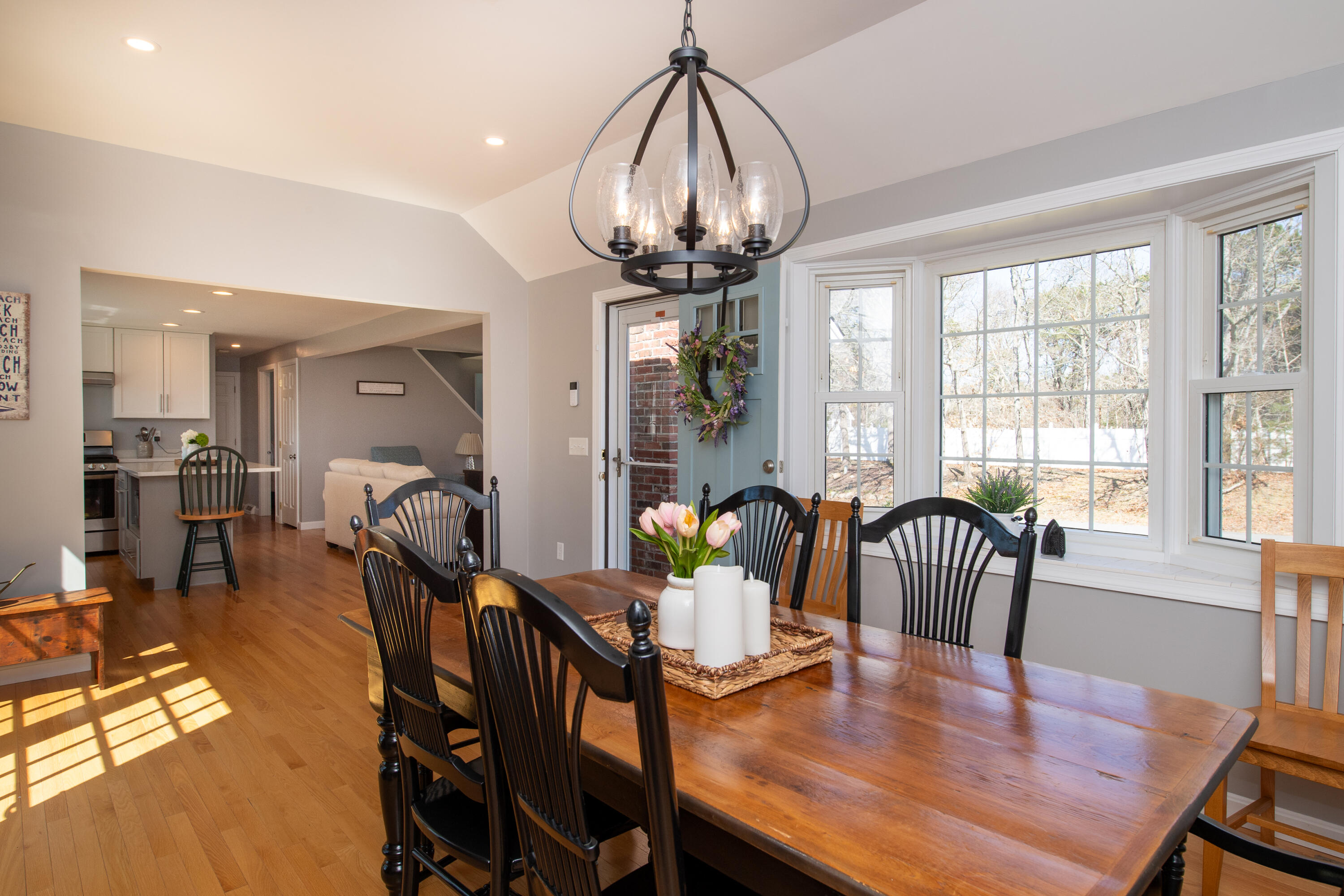 89 Trout Brook Road Cotuit, MA 02635 - Photo 15 of 67 a view of a dining room with furniture window and wooden floor