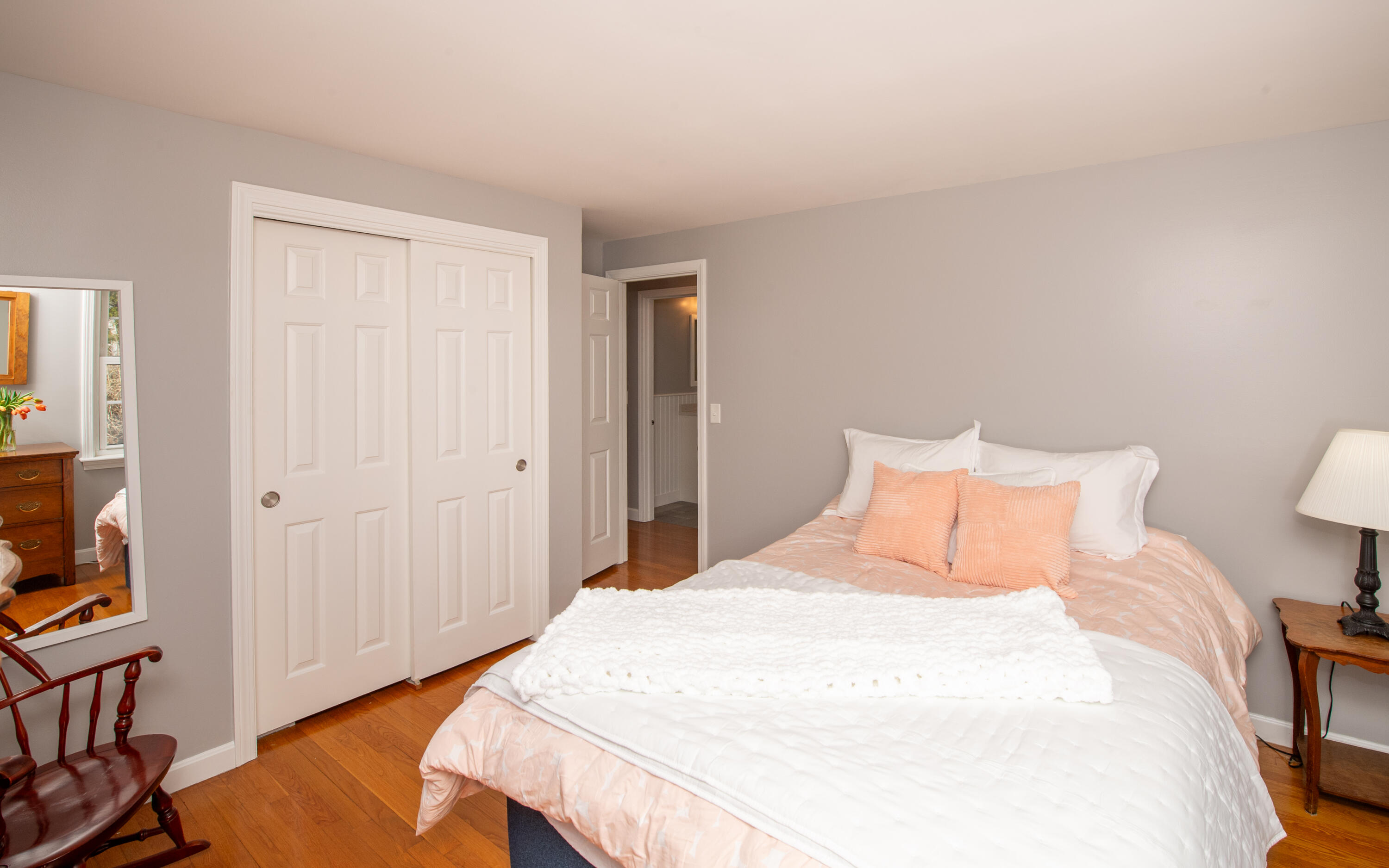 89 Trout Brook Road Cotuit, MA 02635 - Photo 18 of 67 a bedroom with a bed and a closet