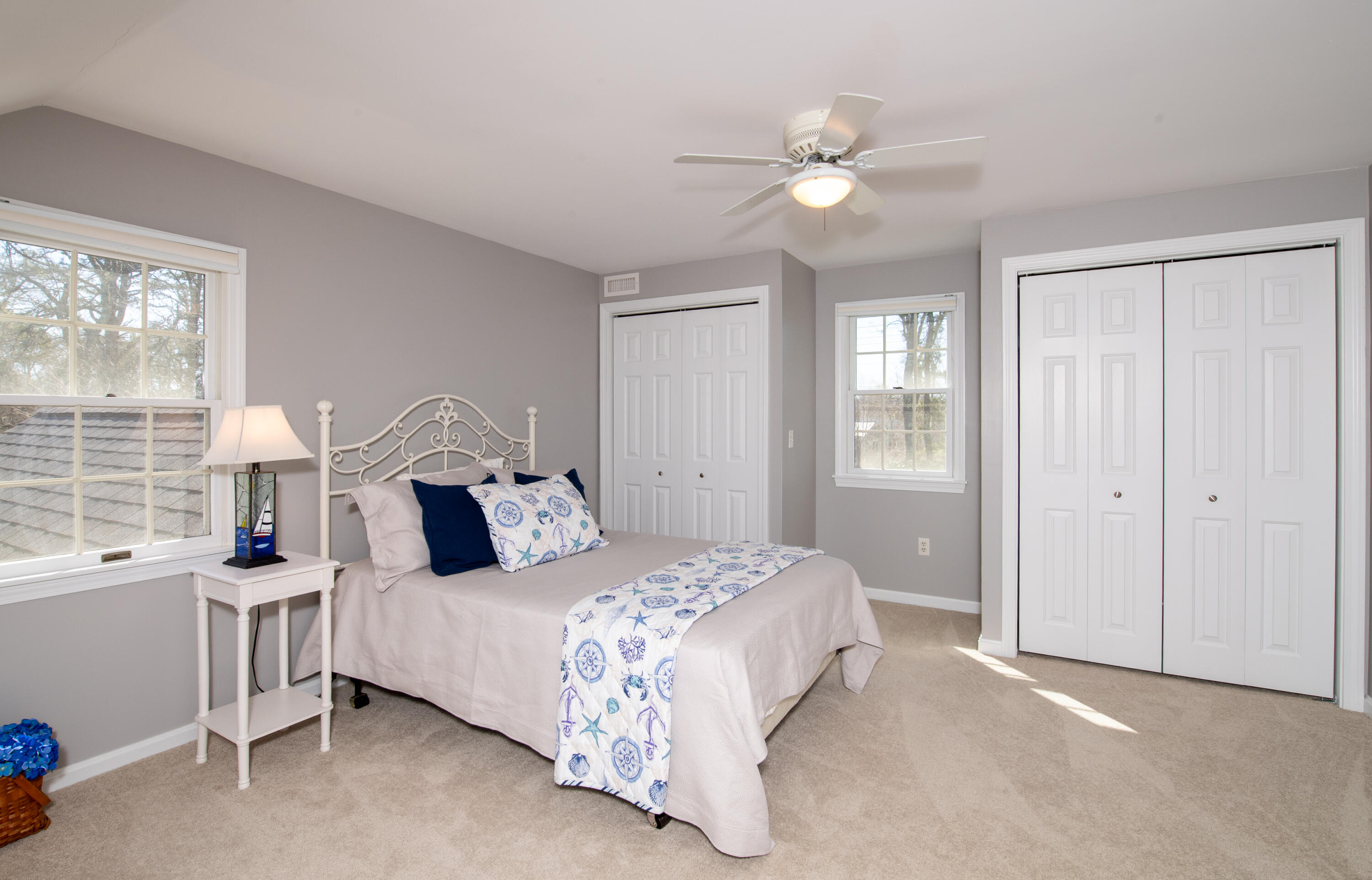 89 Trout Brook Road Cotuit, MA 02635 - Photo 30 of 67 a bedroom with a bed and a window