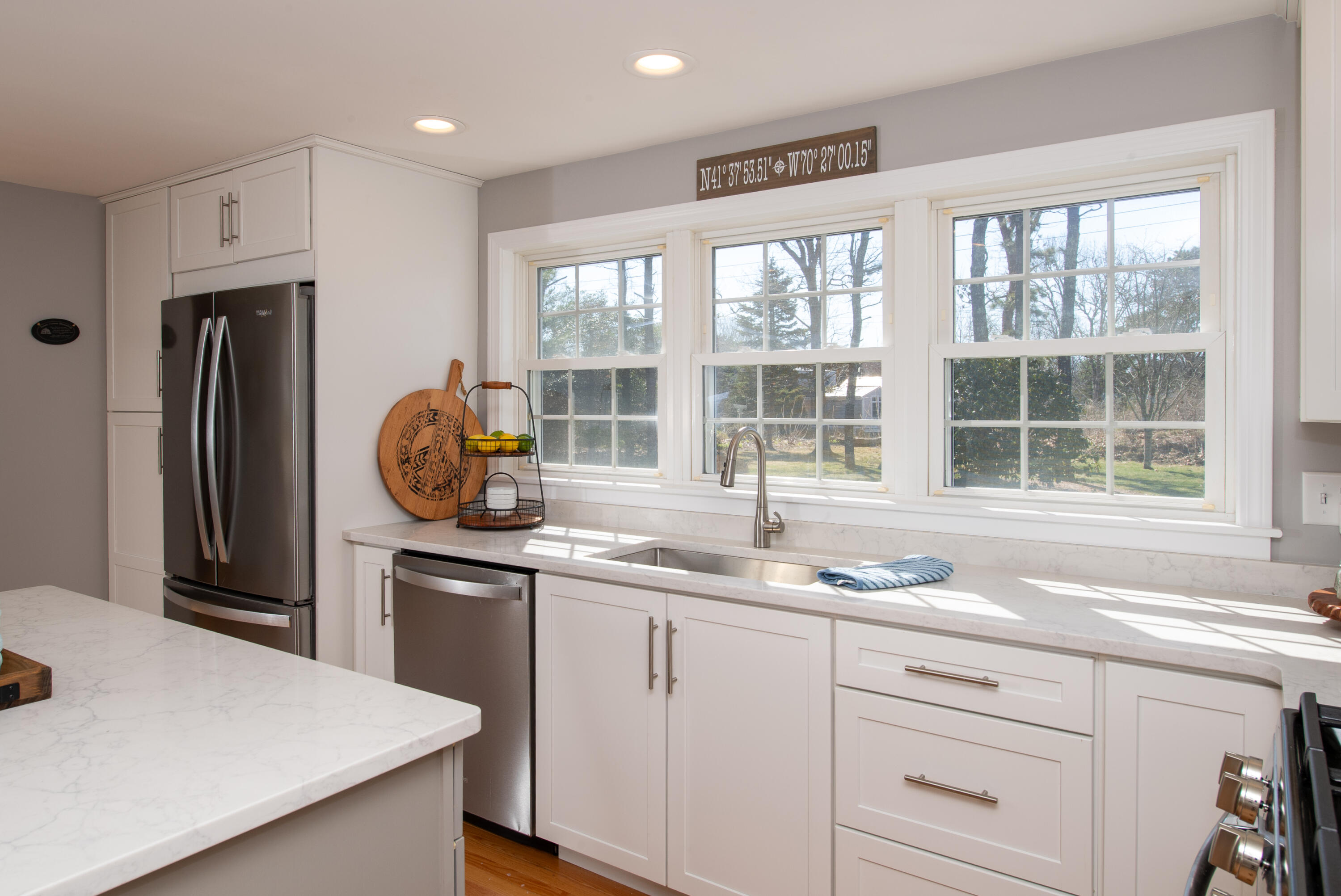 89 Trout Brook Road Cotuit, MA 02635 - Photo 8 of 67 a kitchen with a sink and a window