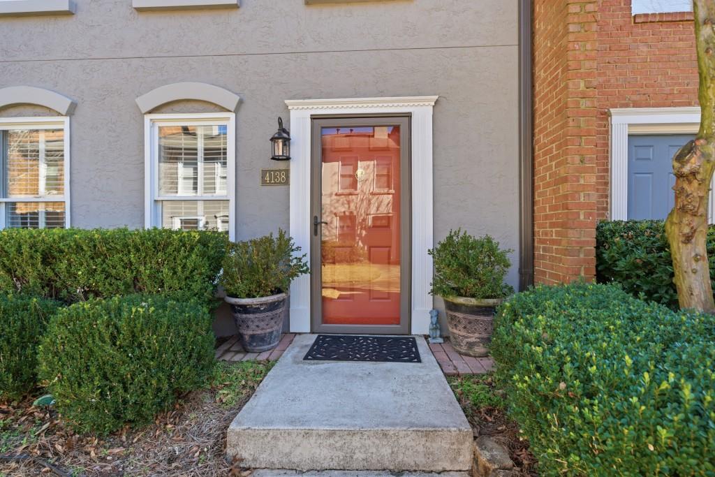 4138 Crape Myrtle Lane Duluth, GA 30096 - Photo 15 of 50 a view of a house with potted plants