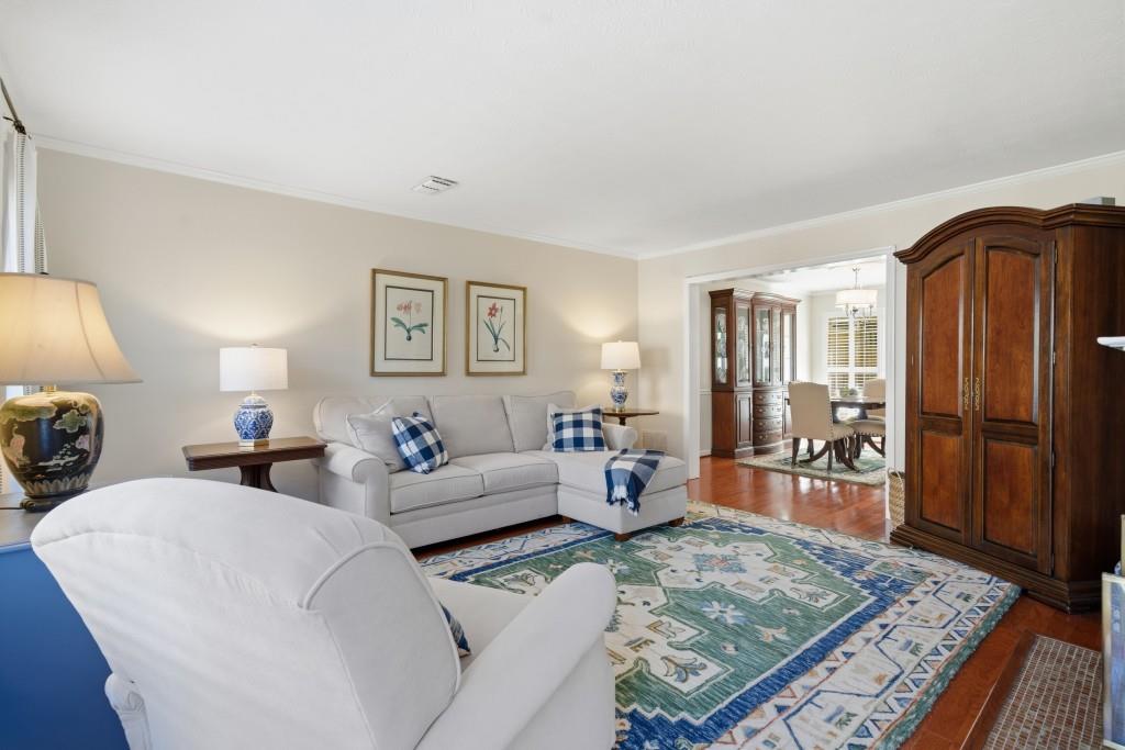 4138 Crape Myrtle Lane Duluth, GA 30096 - Photo 17 of 50 a living room with furniture and wooden floor