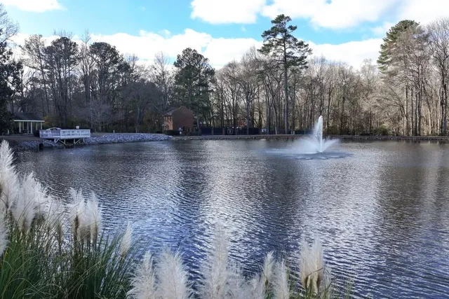 a view of a chair and table in the patio