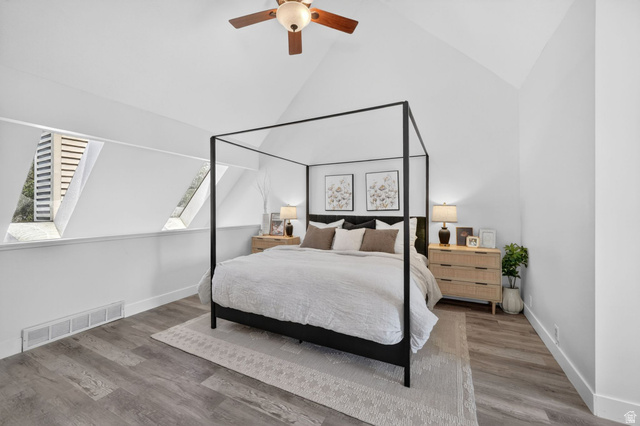 788 East Gables Street Midvale, UT 84047 - Photo 8 of 24 Vaulted ceilings highlight this room featuring a ceiling fan, and 2 skylights