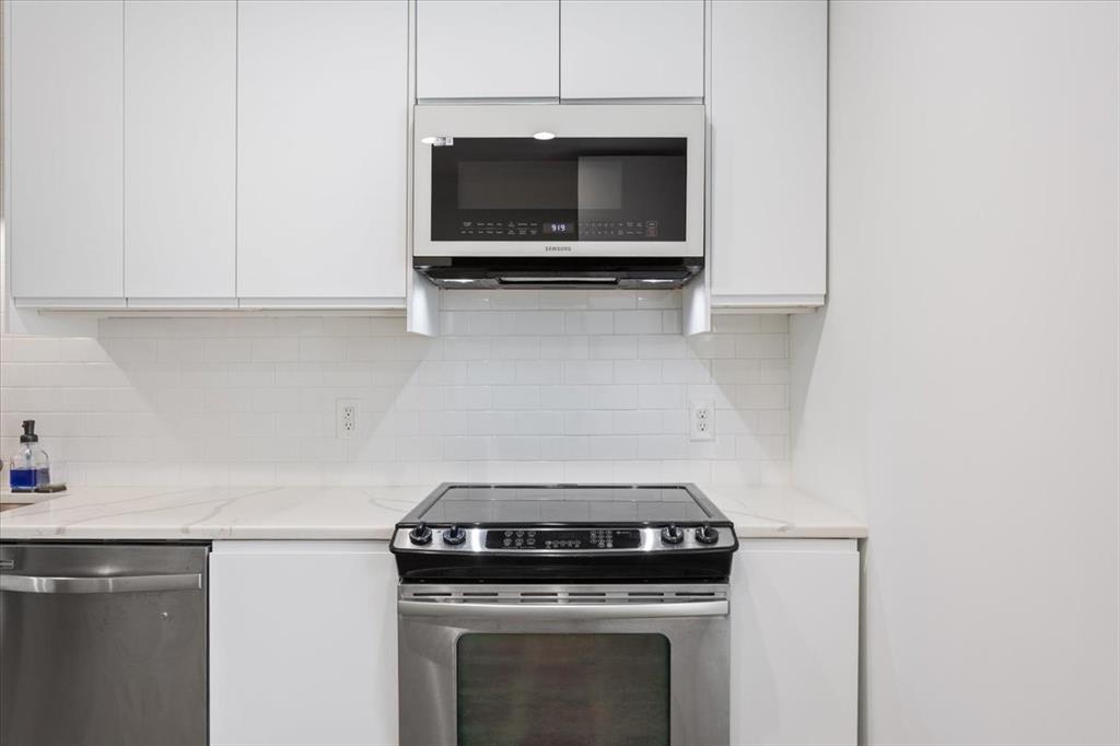 1326 South 12th Street Waco, TX 76706 - Photo 13 of 25 a stove top oven sitting inside of a kitchen