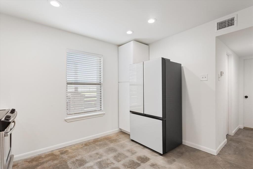 1326 South 12th Street Waco, TX 76706 - Photo 14 of 25 a view of kitchen with refrigerator and window