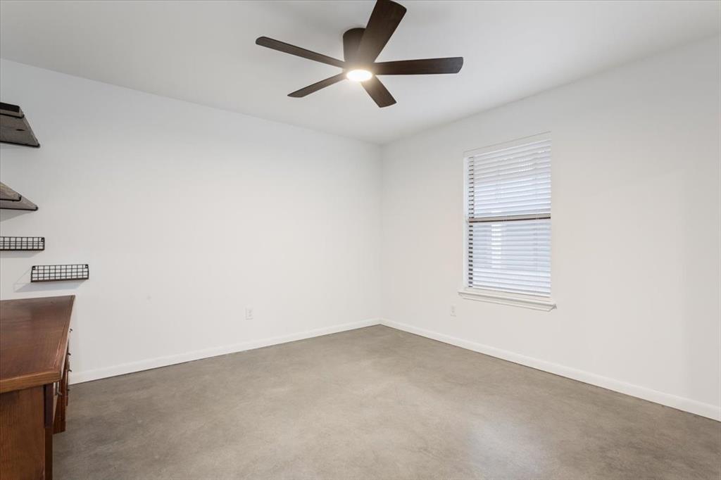 1326 South 12th Street Waco, TX 76706 - Photo 15 of 25 an empty room with a window and a fan